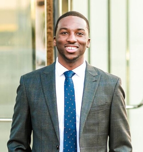 Charles Hands in a suit